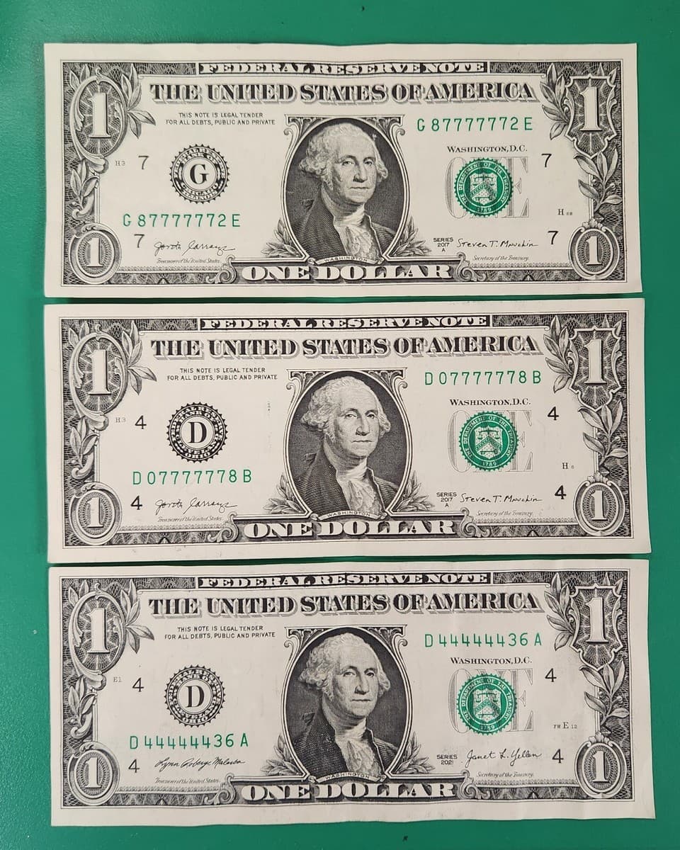 Six of a Kind dollar bill showing serial 87777772